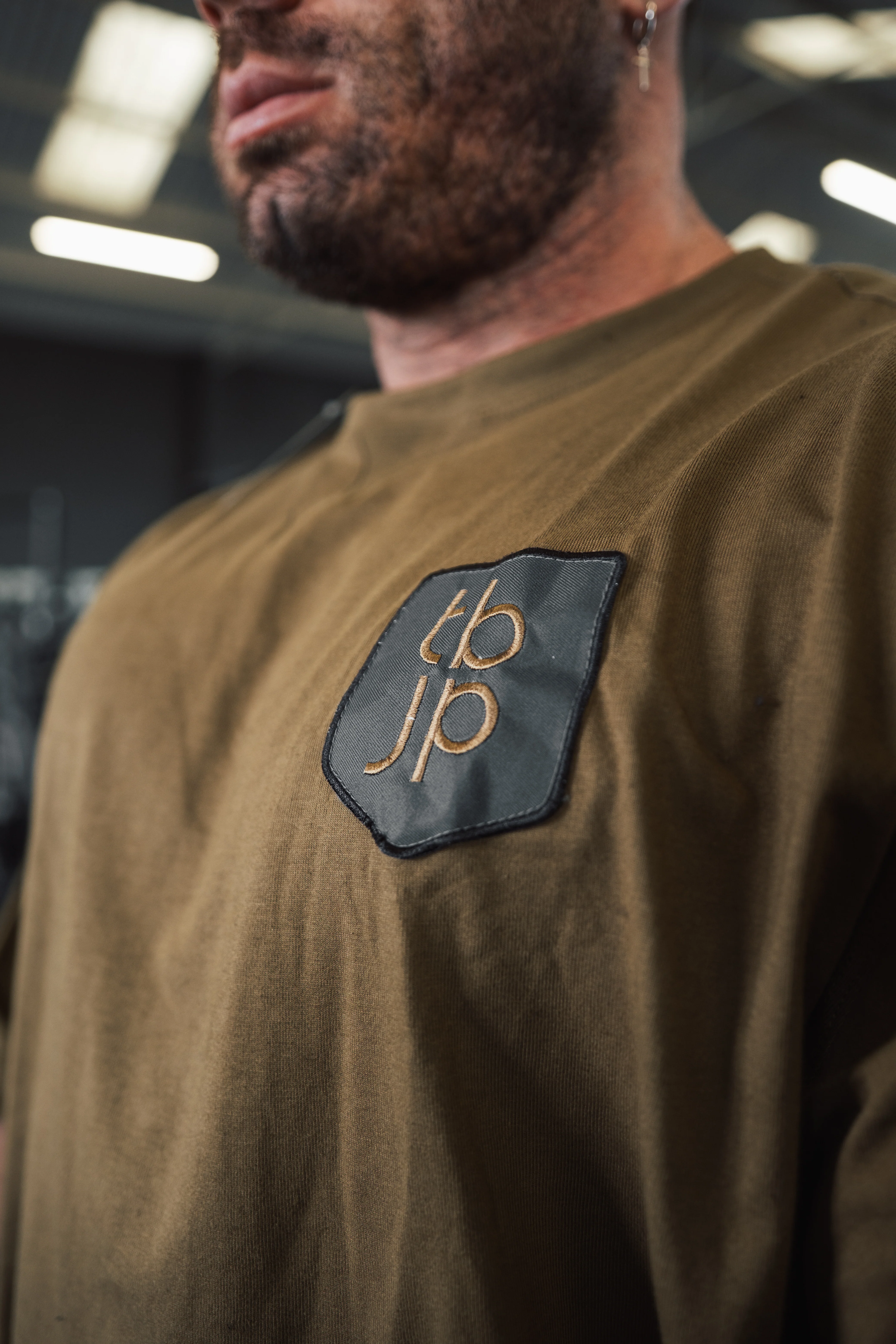 The Shield Tshirt in Olive - Image 2